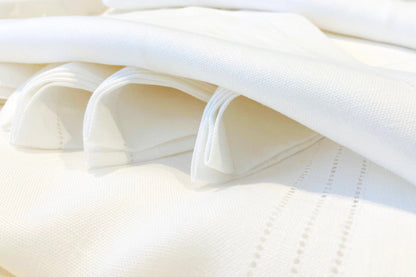 Table runners and napkins made from pure linen with hemstitched edges